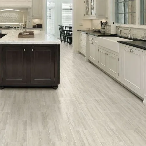 Vinyl flooring with intricate mosaic patterns in a vibrant kitchen