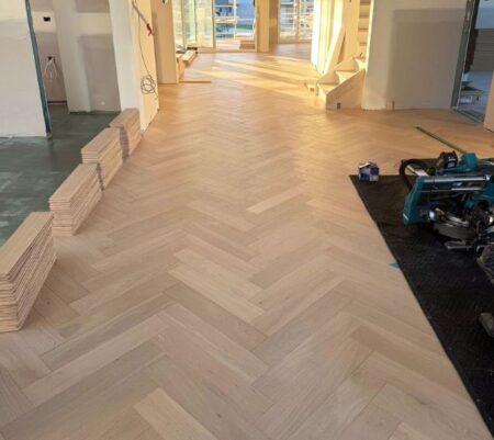 Herringbone flooring installation in Dubai